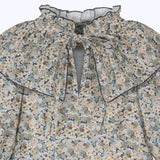 Blusa babero floral beige