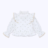 Blusa vuelos fondo blanco