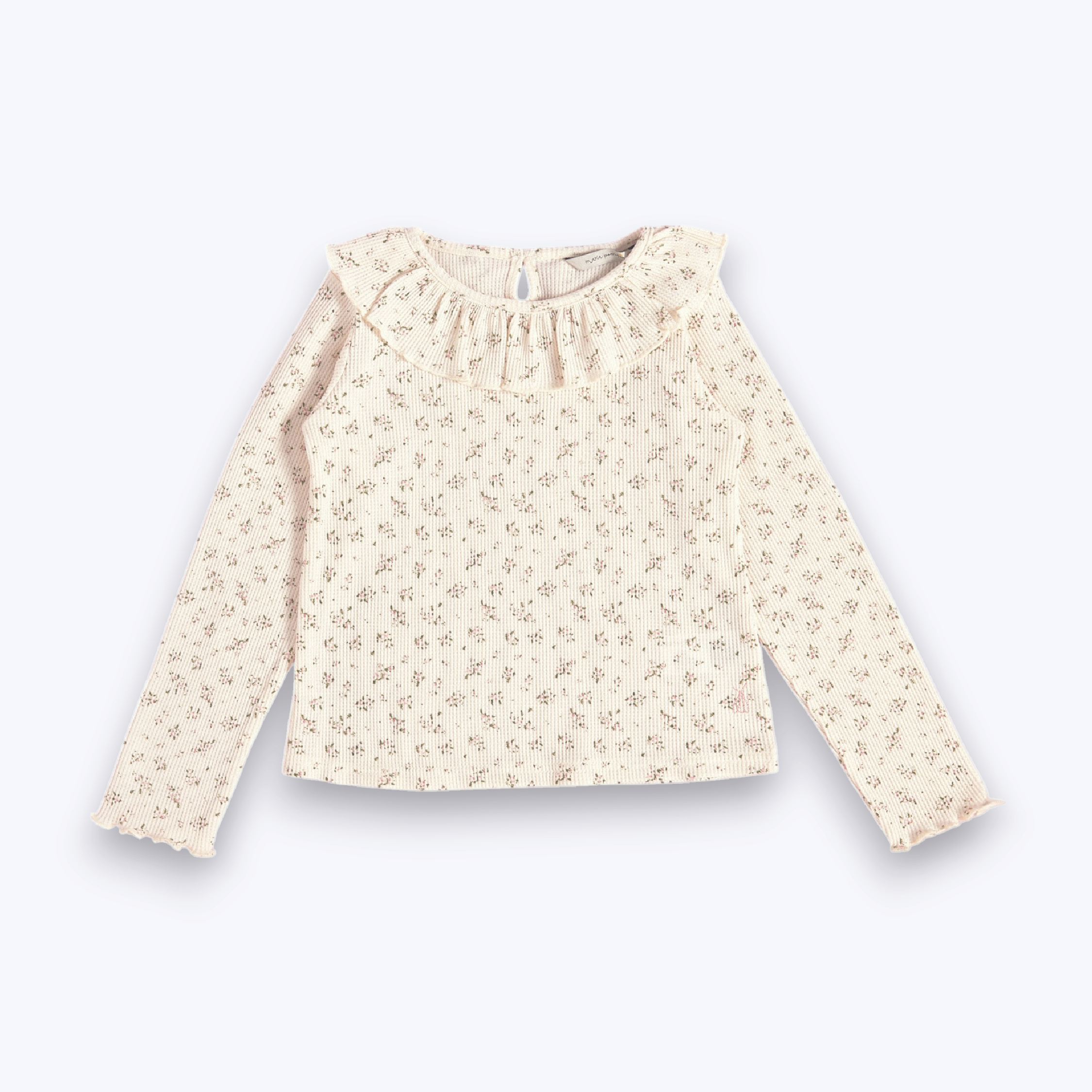 Polera cuello vuelo flor