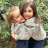 Blusa babero floral beige